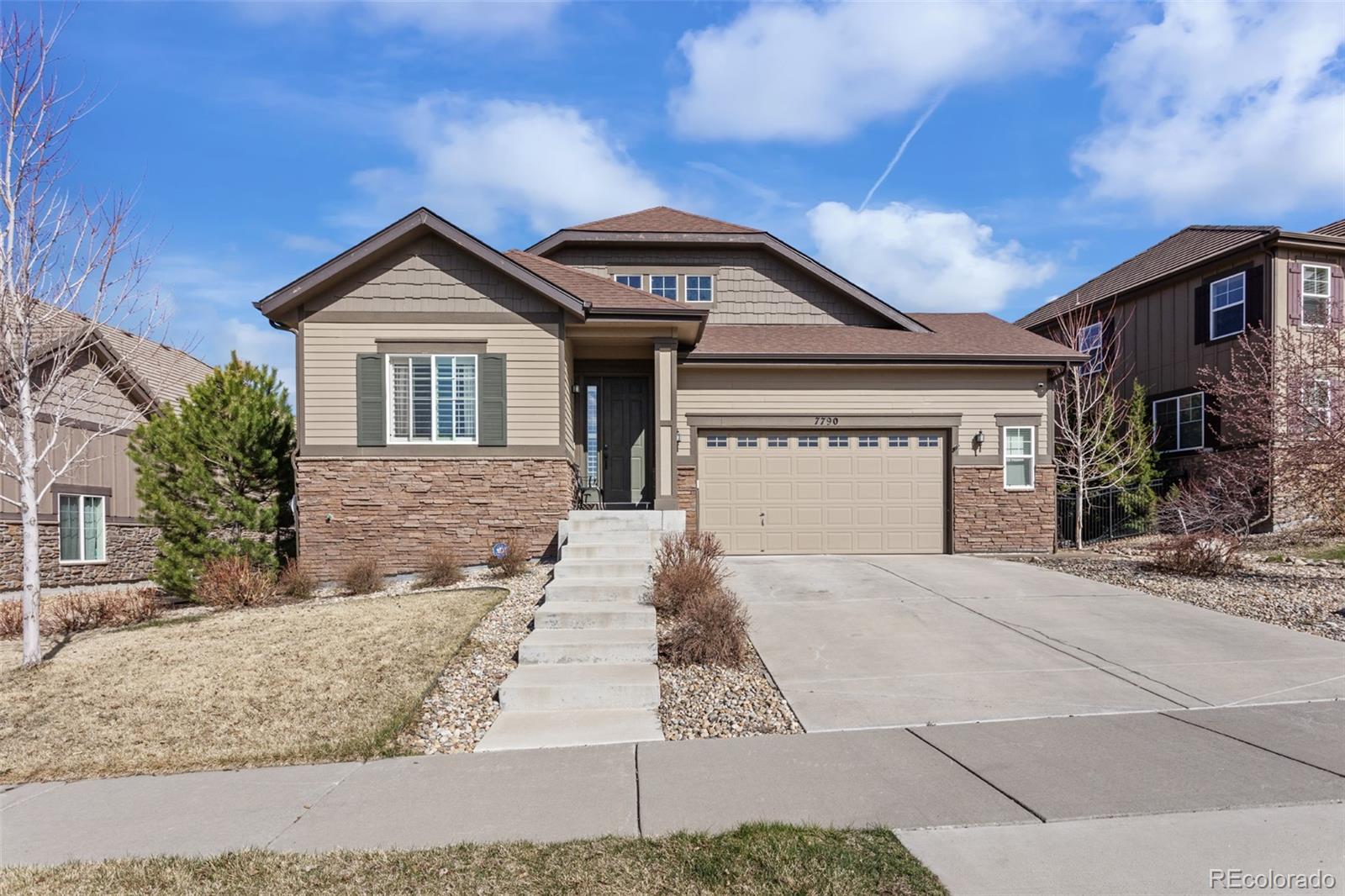 a front view of a house with yard