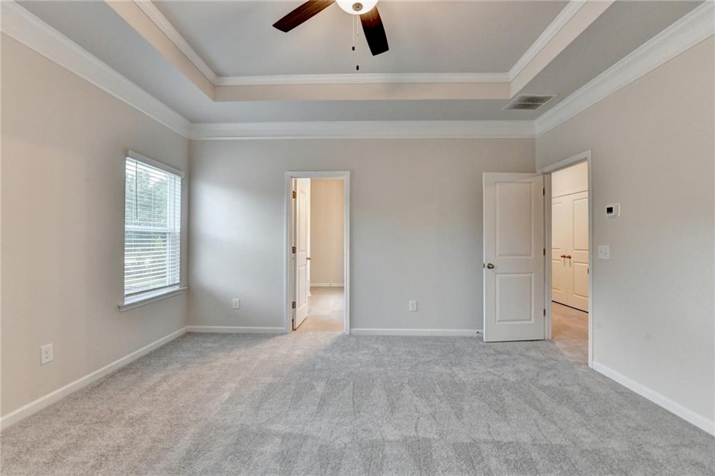 1431 Winding Rdg Trail Auburn, GA 30011 - Photo 5 of 53 a view of an empty room with a window
