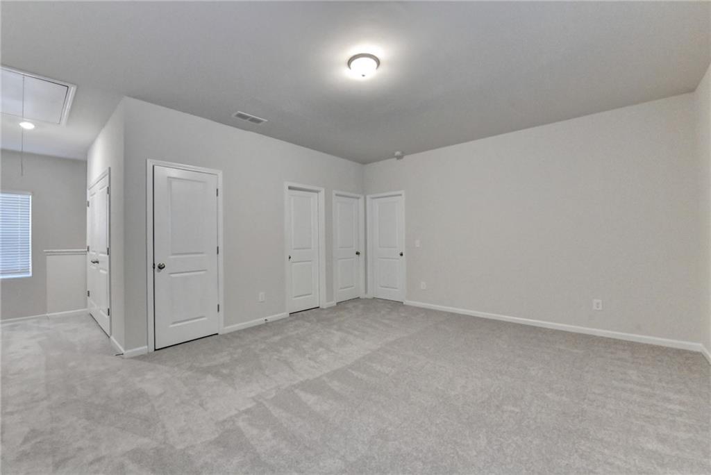 1431 Winding Rdg Trail Auburn, GA 30011 - Photo 8 of 53 a view of an empty room