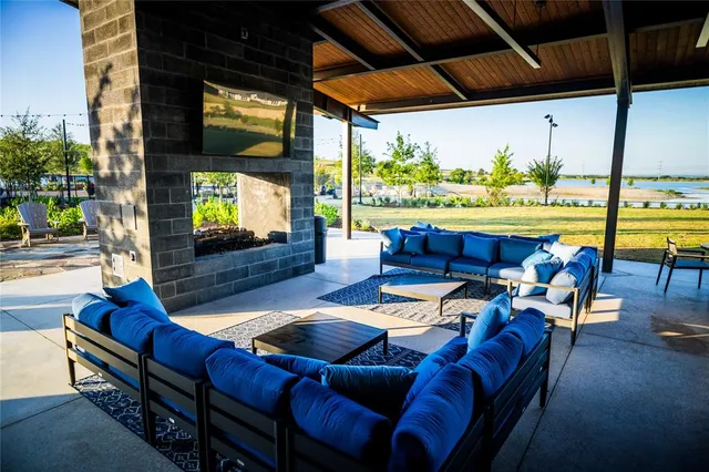 a outdoor living space with furniture and garden view