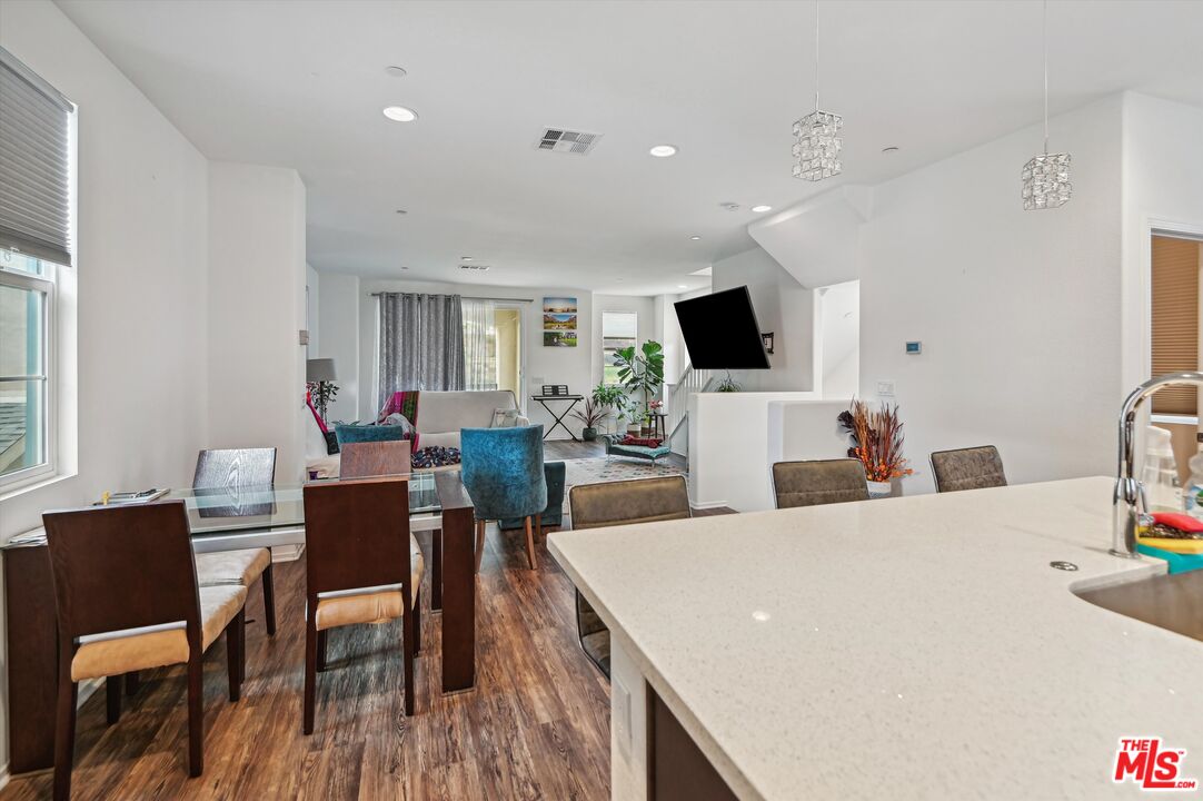 7329 Garnet Ridge Road Jurupa Valley, CA 92509 - Photo 8 of 35 a view of a dining room with furniture