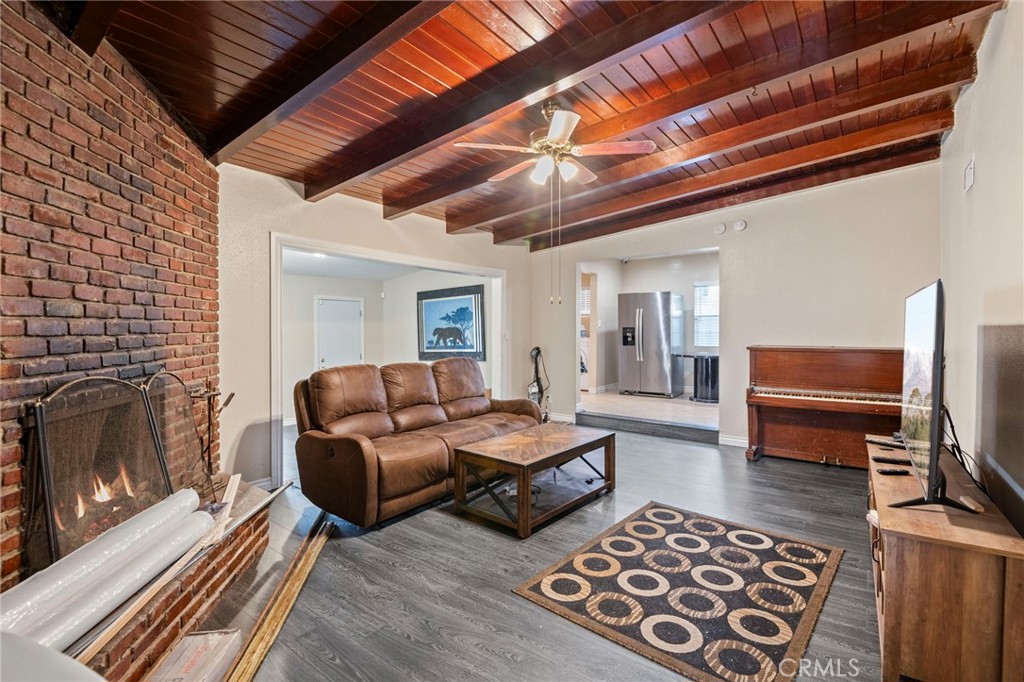 12617 South Halo Drive Compton, CA 90221 - Photo 3 of 11 a living room with furniture and a fireplace