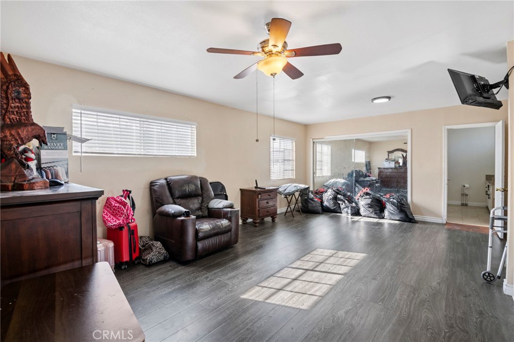 12617 South Halo Drive Compton, CA 90221 - Photo 7 of 11 a living room with furniture and a wooden floor