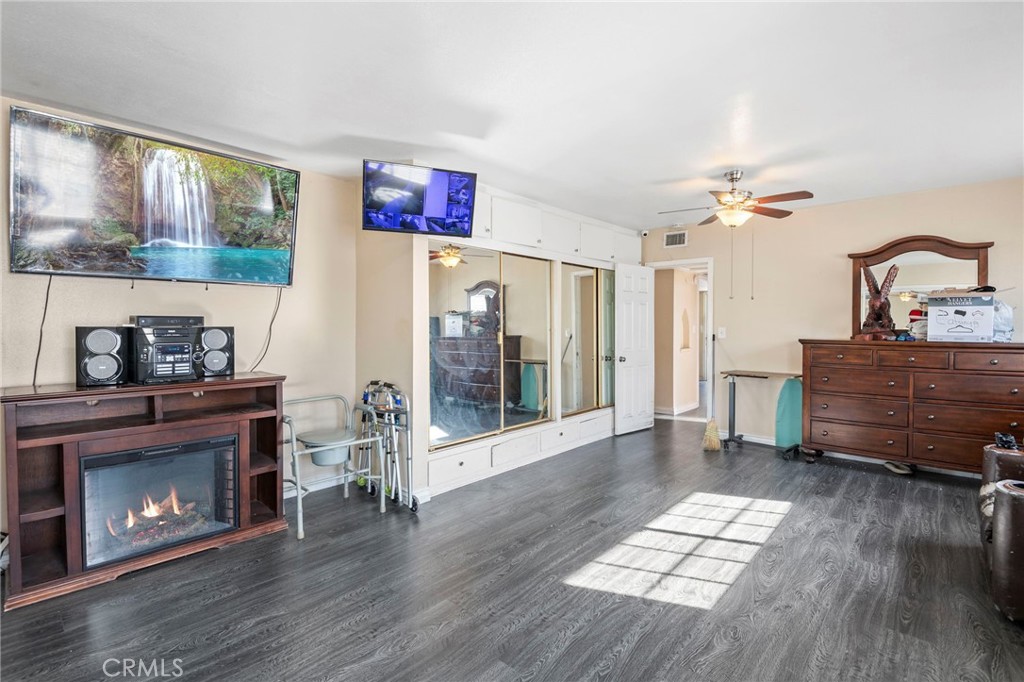 12617 South Halo Drive Compton, CA 90221 - Photo 8 of 11 a living room with furniture and wooden floor