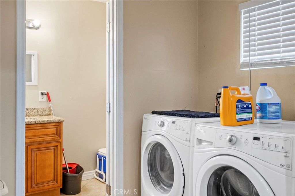 12617 South Halo Drive Compton, CA 90221 - Photo 10 of 11 a utility room with dryer and washer