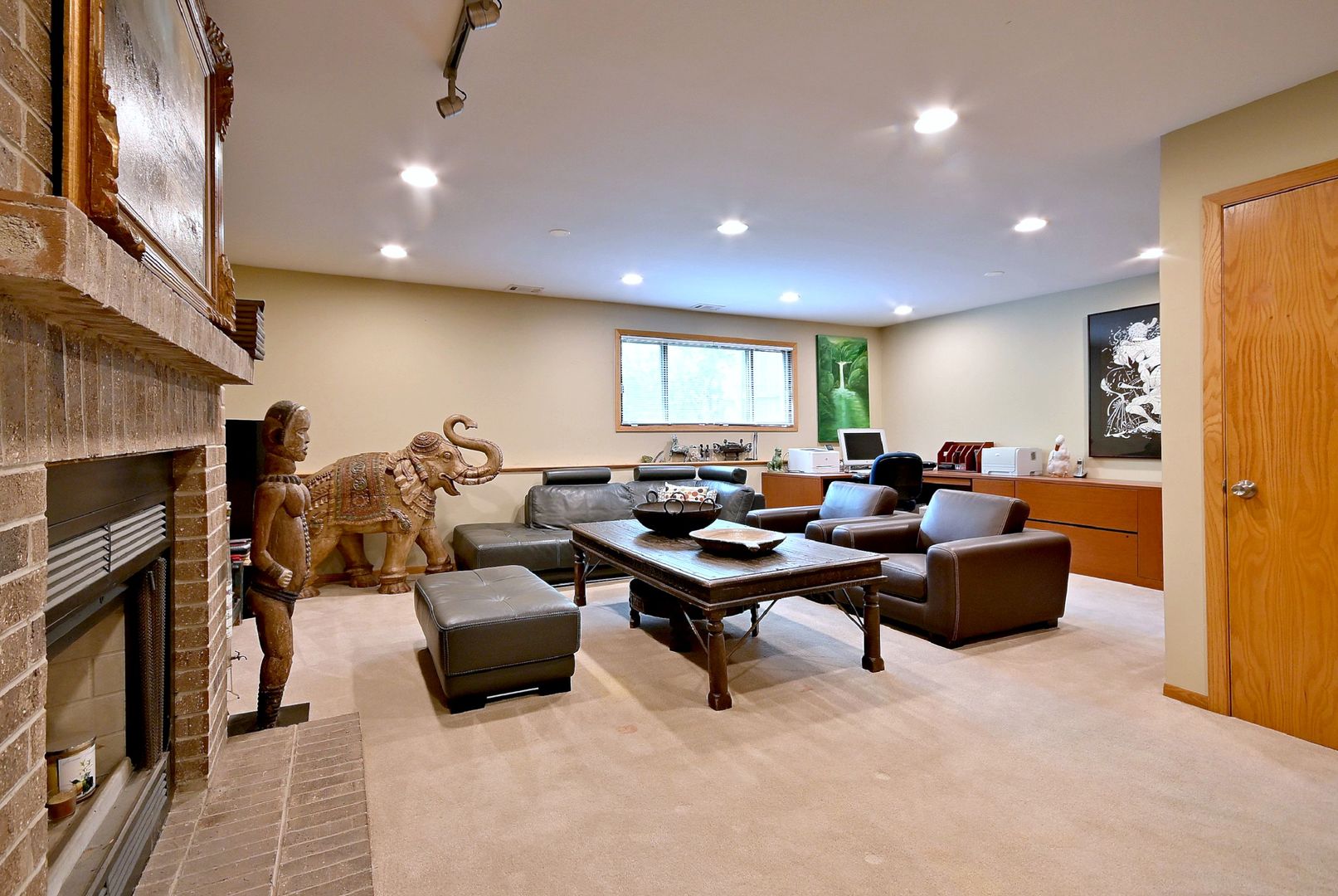 2350 North Sayre Avenue, Unit G Chicago, IL 60707 - Photo 18 of 30 a living room with furniture a fireplace a flat screen tv and a window