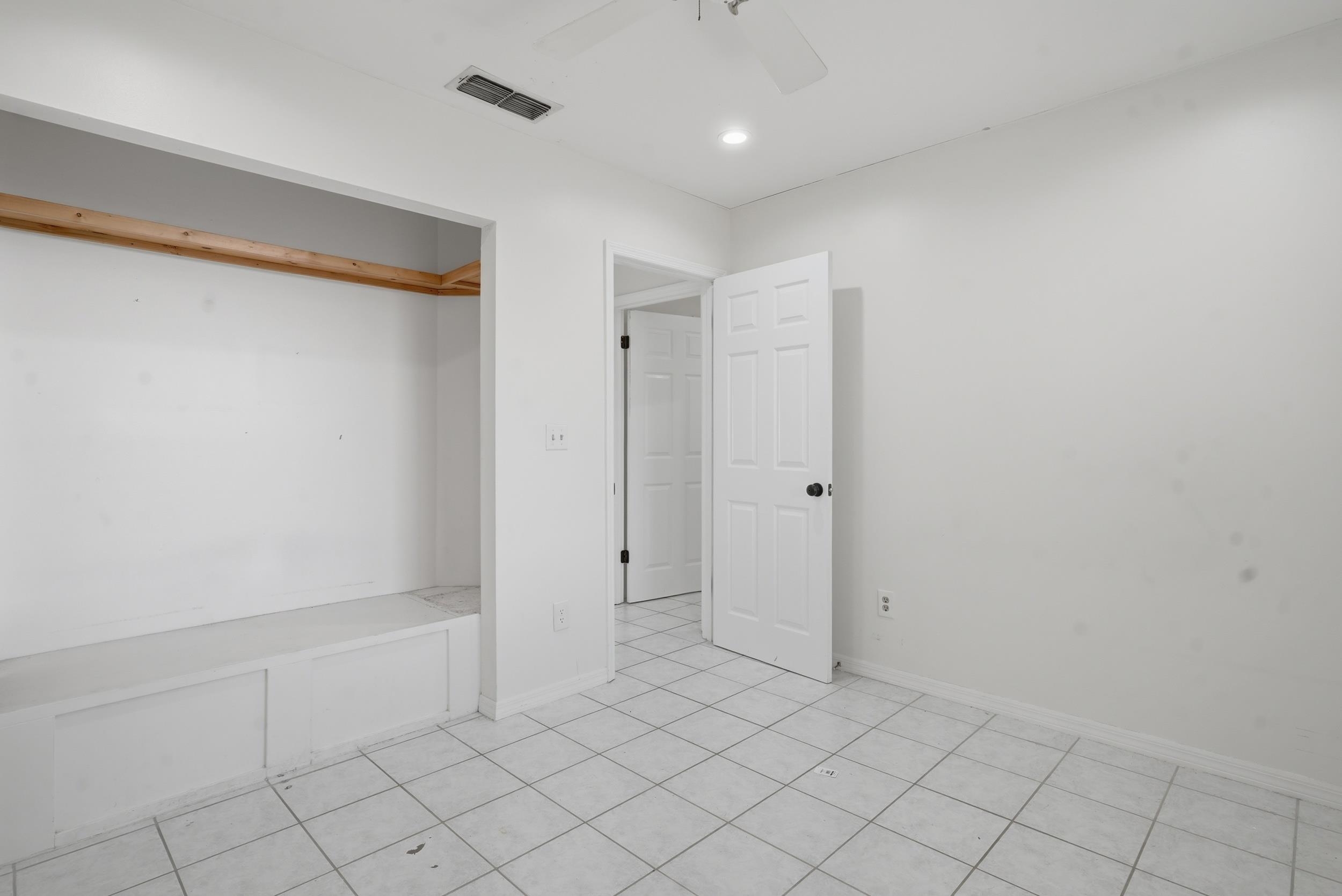 904 Alicante Road St. Augustine, FL 32086 - Photo 16 of 32 Unfurnished bedroom with a ceiling fan, recessed lighting, and a closet