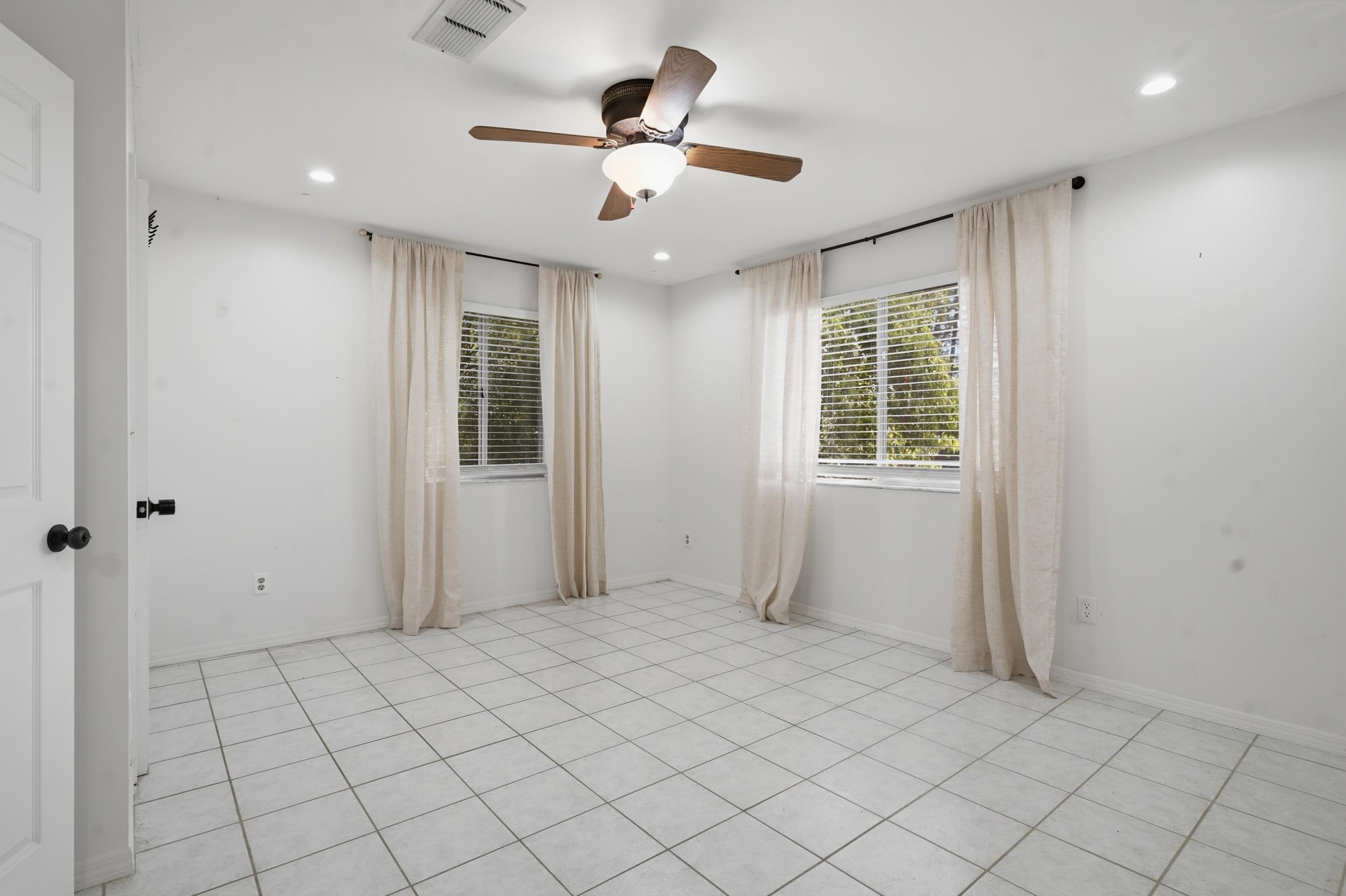 904 Alicante Road St. Augustine, FL 32086 - Photo 17 of 32 Unfurnished room featuring recessed lighting, a ceiling fan, and light tile patterned floors
