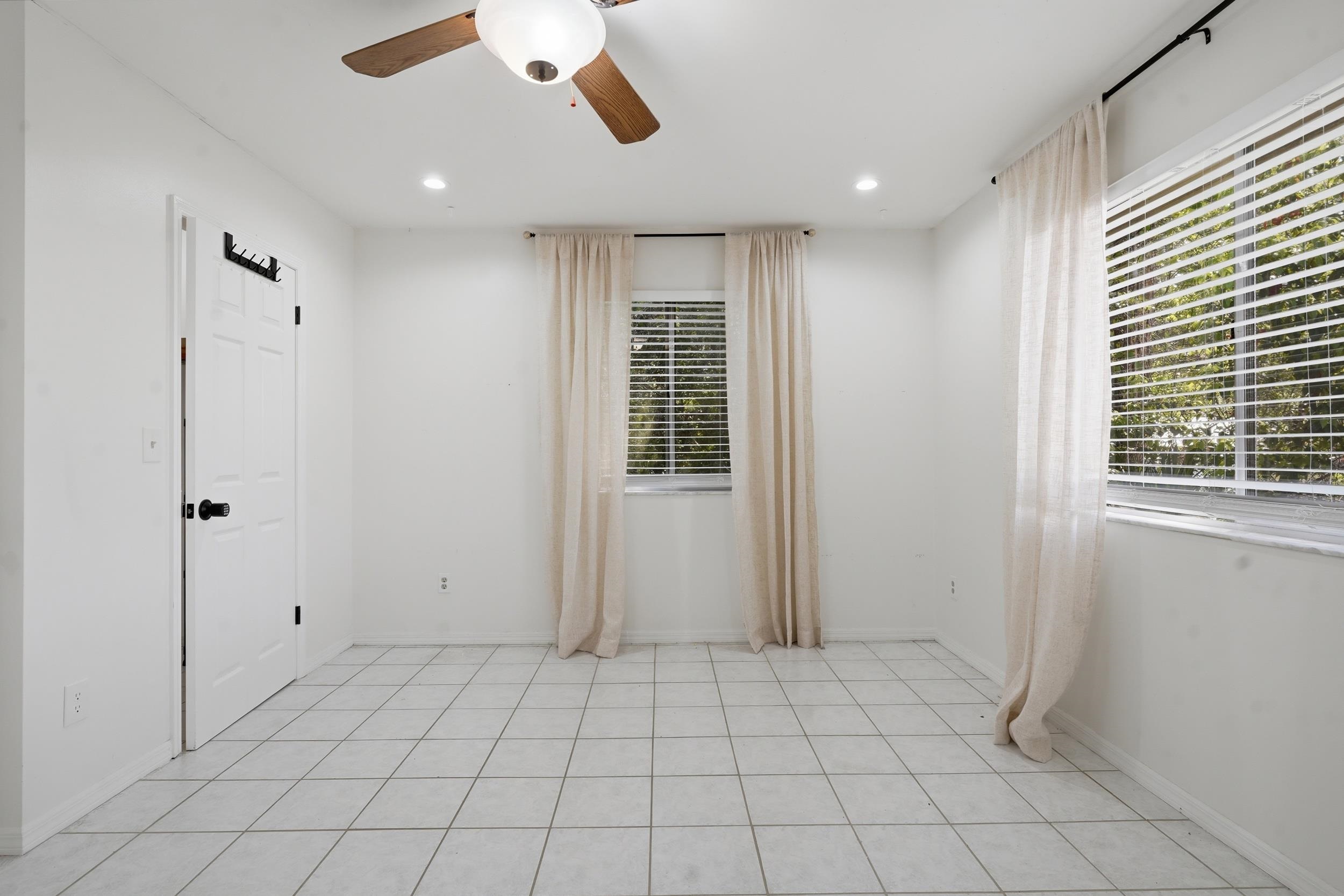 904 Alicante Road St. Augustine, FL 32086 - Photo 18 of 32 Unfurnished room with ceiling fan, recessed lighting, and light tile patterned floors