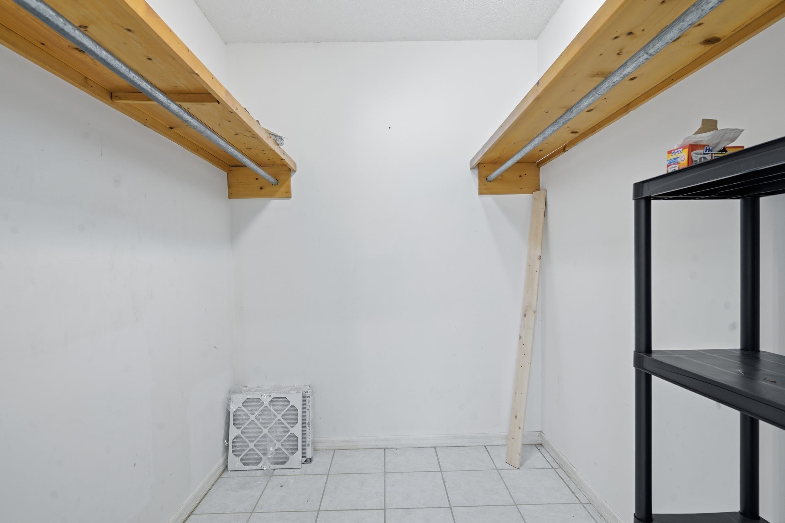 904 Alicante Road St. Augustine, FL 32086 - Photo 20 of 32 Walk in closet with light tile patterned flooring