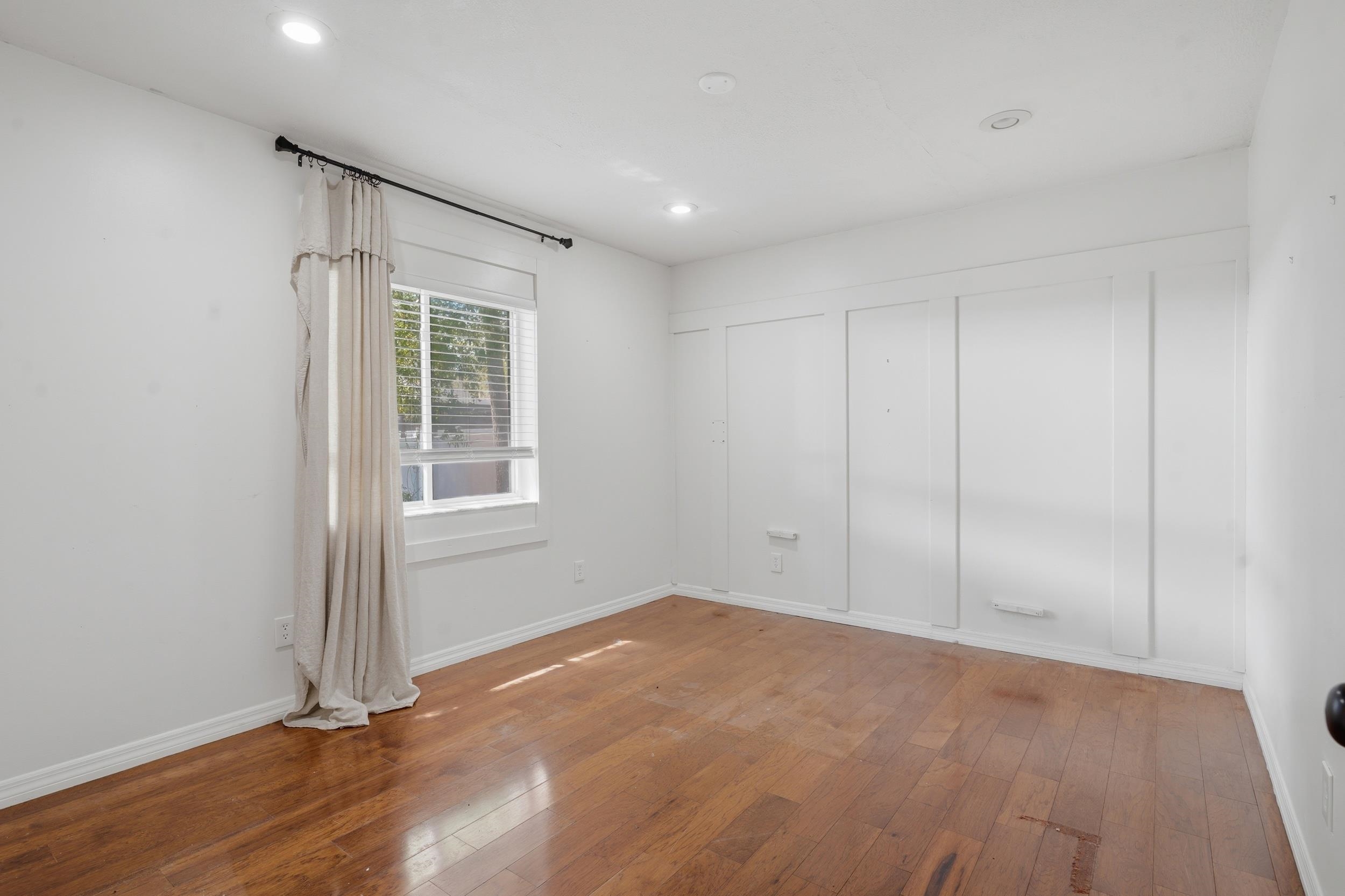 904 Alicante Road St. Augustine, FL 32086 - Photo 24 of 32 Unfurnished bedroom featuring hardwood / wood-style floors and recessed lighting