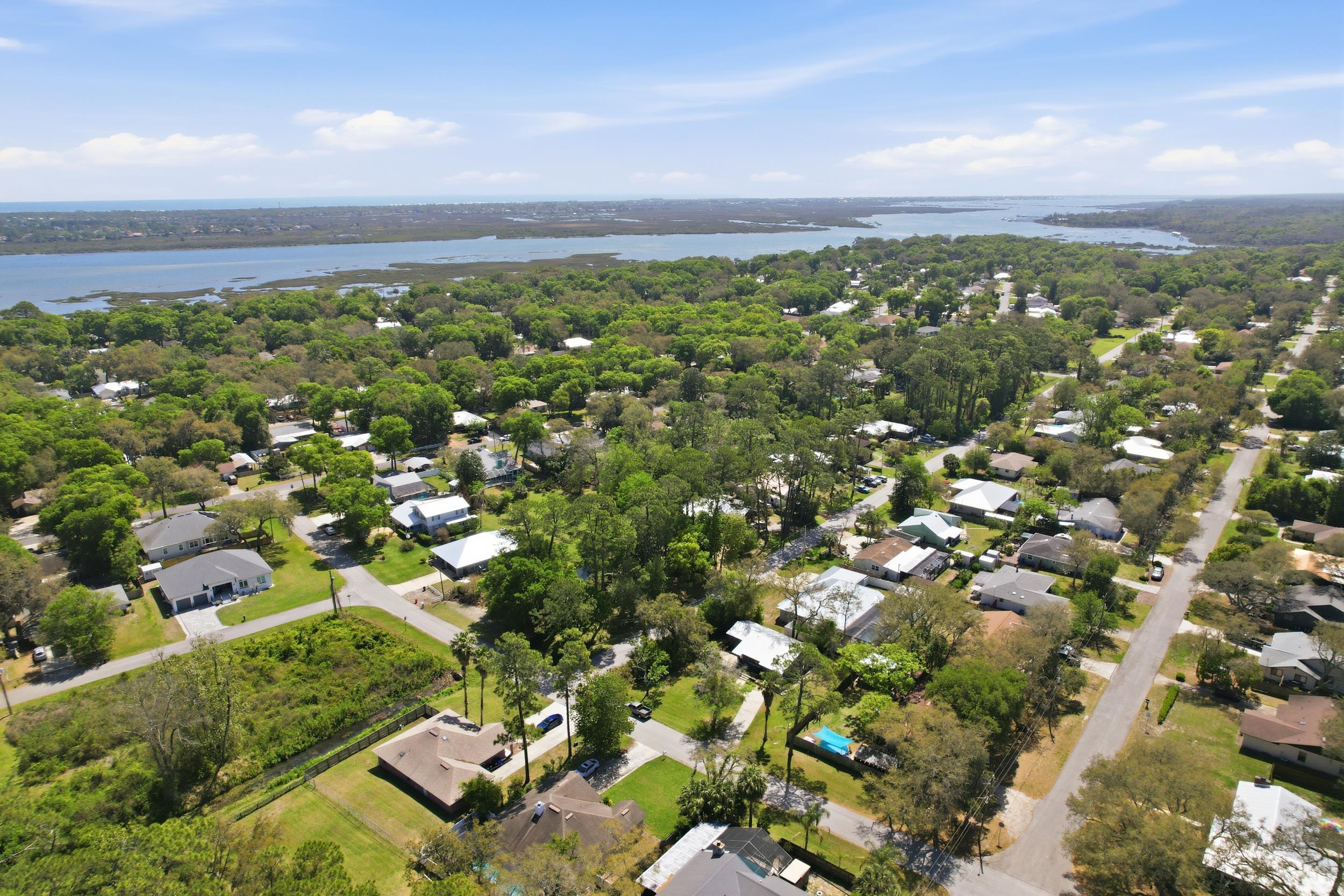 904 Alicante Road St. Augustine, FL 32086 - Photo 30 of 32 Aerial perspective of suburban area featuring a large body of water