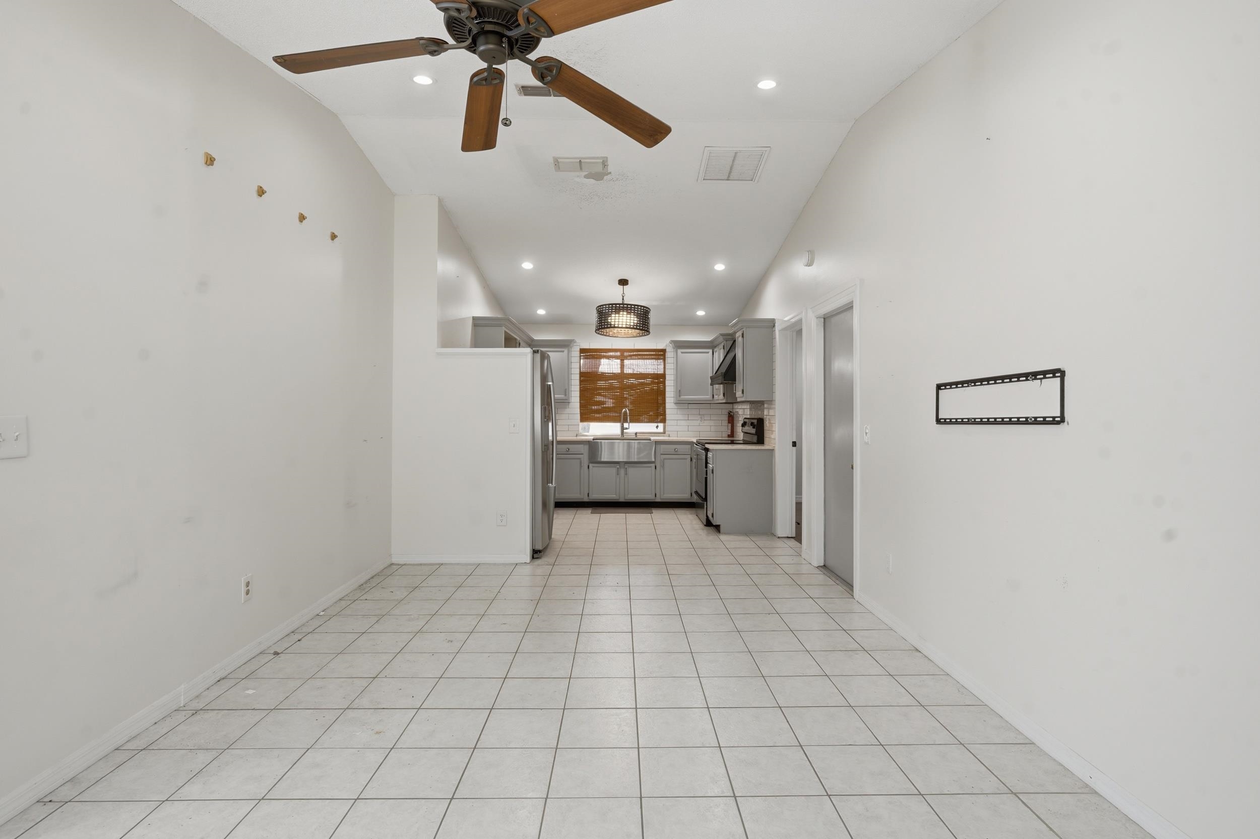 904 Alicante Road St. Augustine, FL 32086 - Photo 8 of 32 Unfurnished living room featuring a ceiling fan, light tile patterned flooring, and recessed lighting
