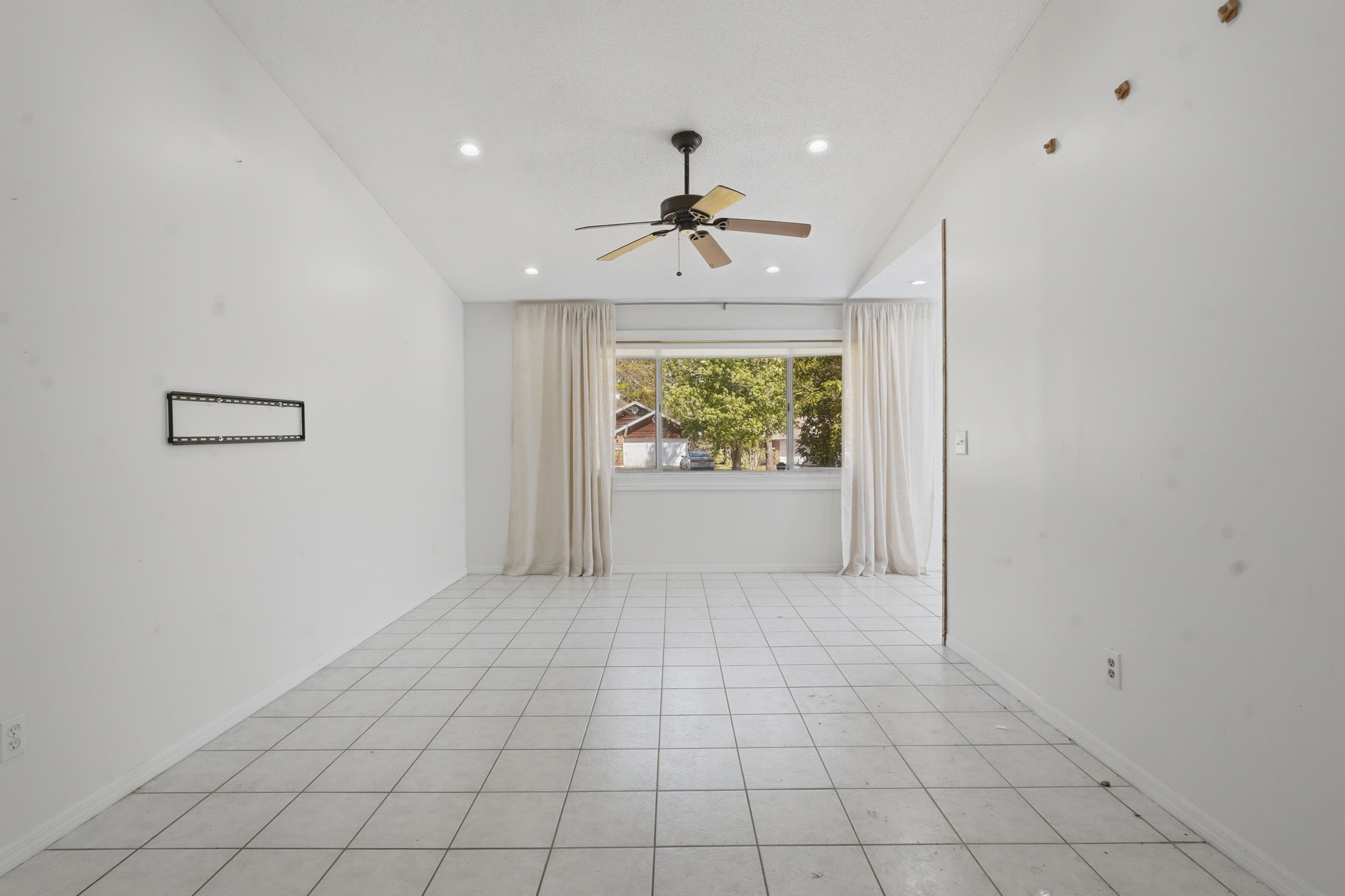 904 Alicante Road St. Augustine, FL 32086 - Photo 10 of 32 Unfurnished room featuring light tile patterned floors, ceiling fan, and recessed lighting