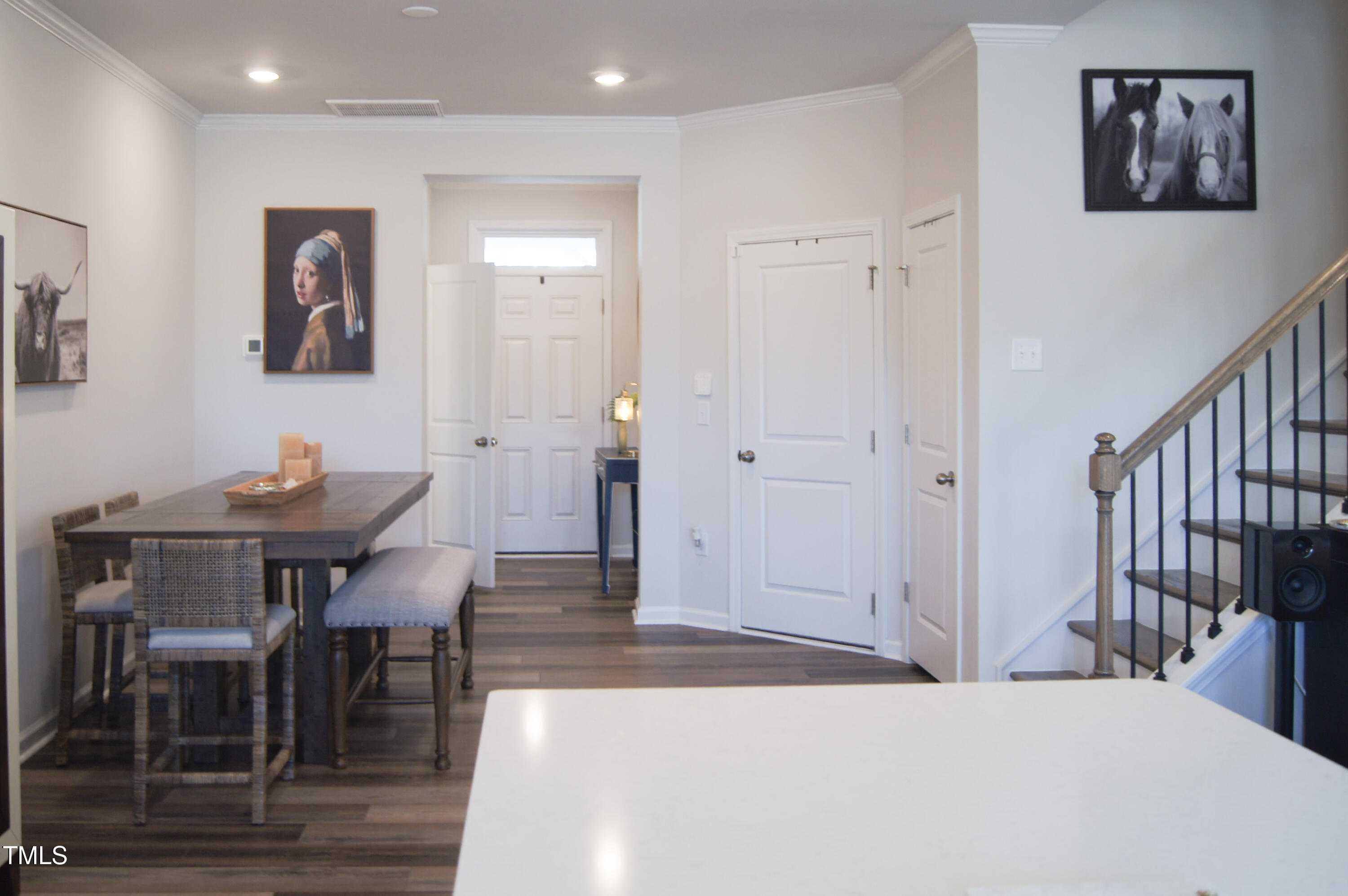 5006 Tura Street Raleigh, NC 27610 - Photo 20 of 67 a bedroom with a bed and a table in it