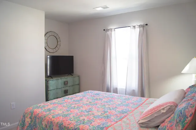 a sign that is on a brick wall