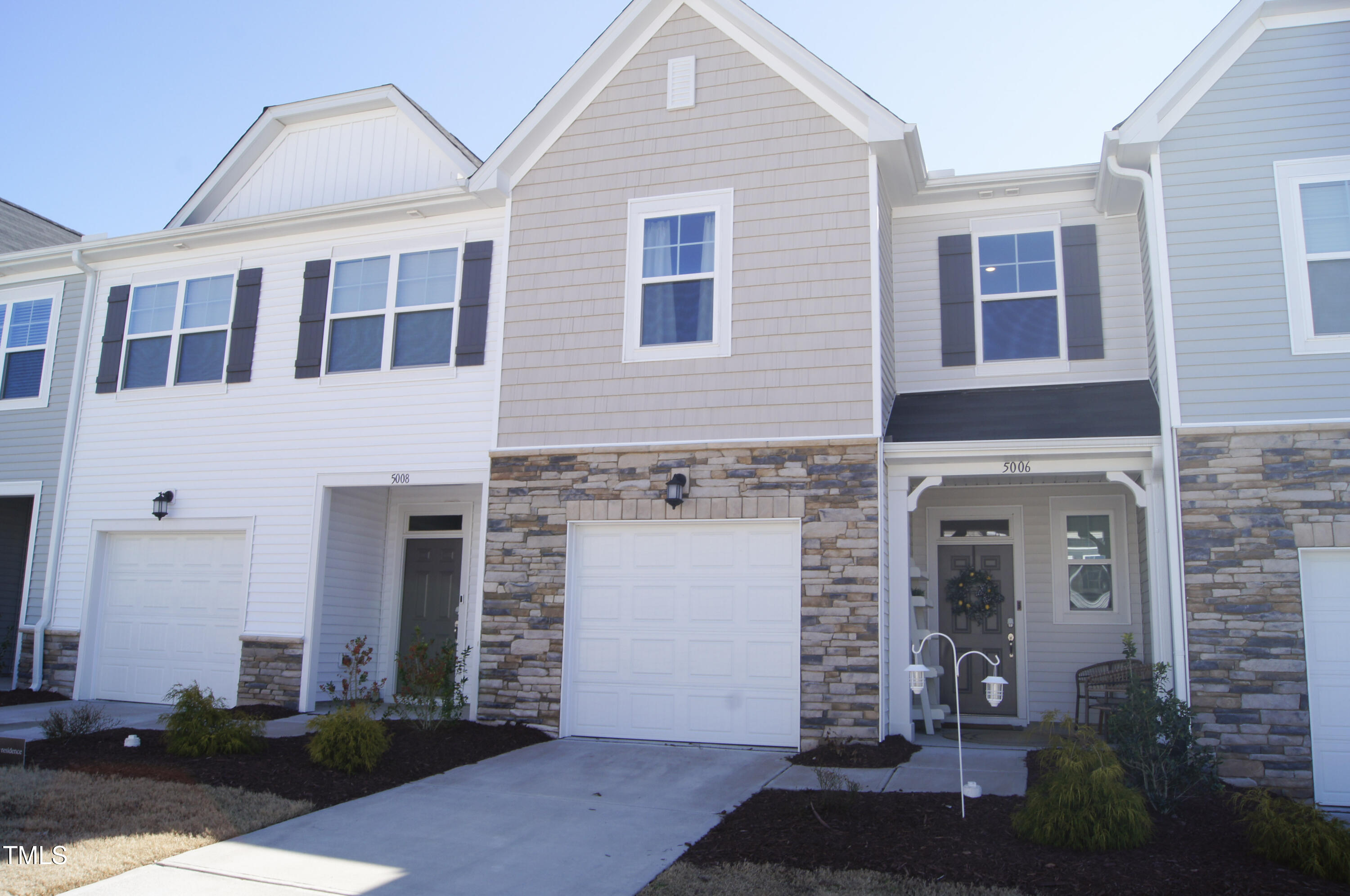 5006 Tura Street Raleigh, NC 27610 - Photo 3 of 67 a front view of a house with a yard