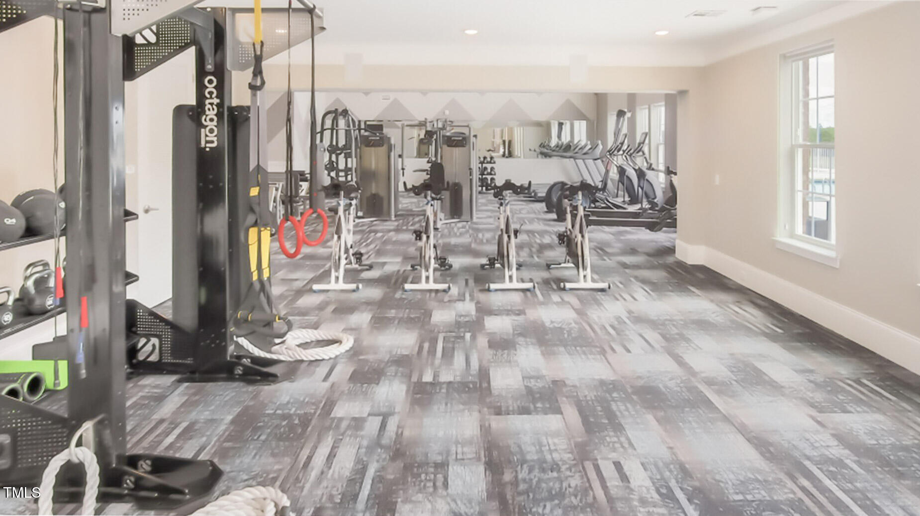 5006 Tura Street Raleigh, NC 27610 - Photo 58 of 67 a view of livingroom with furniture and floor to ceiling window