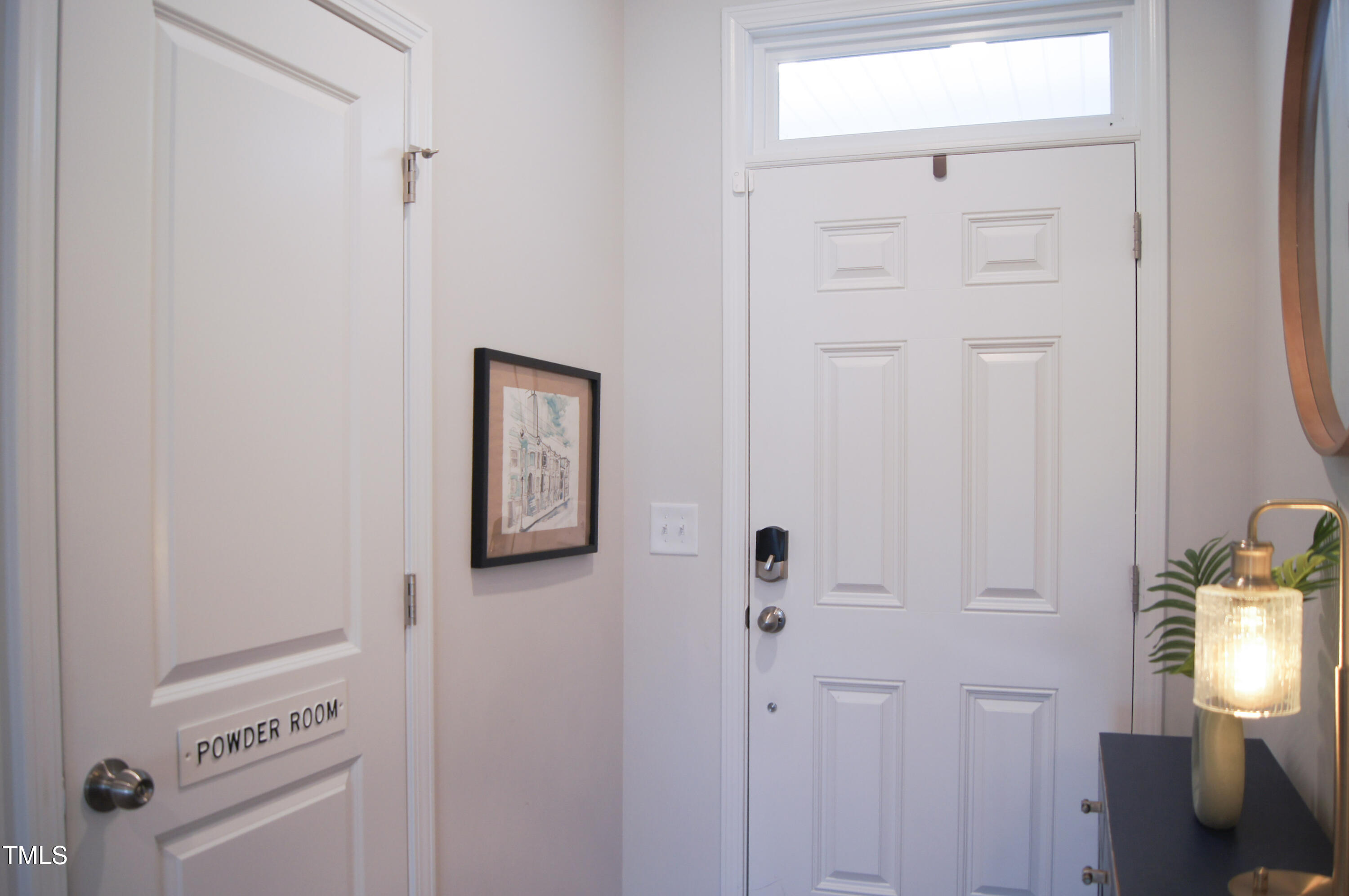 5006 Tura Street Raleigh, NC 27610 - Photo 9 of 67 a view of a hallway with entryway door