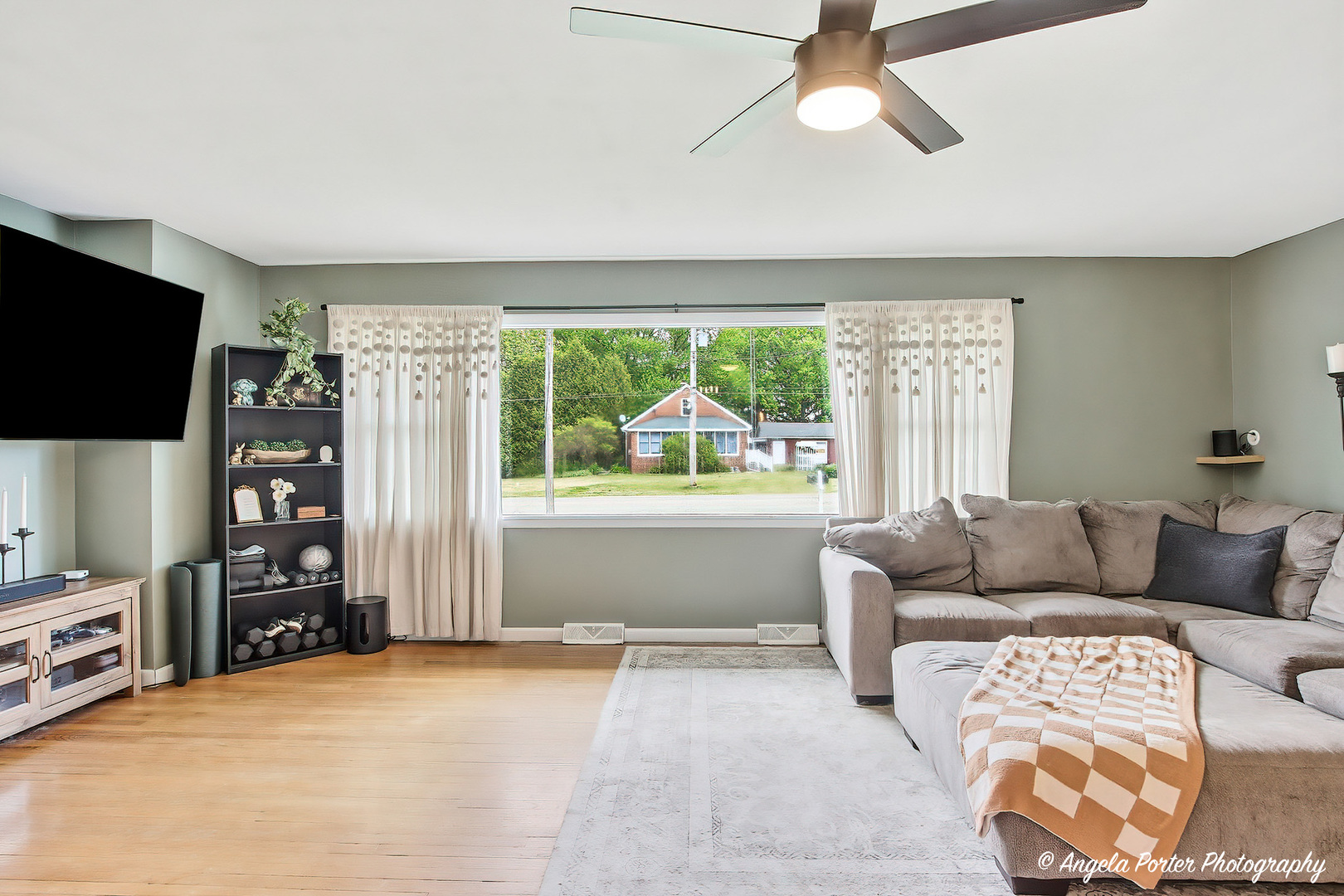 353 Marengo Road Harvard, IL 60033 - Photo 6 of 23 a living room with furniture and a flat screen tv