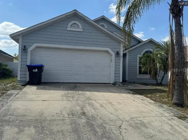 a front view of a house with garage