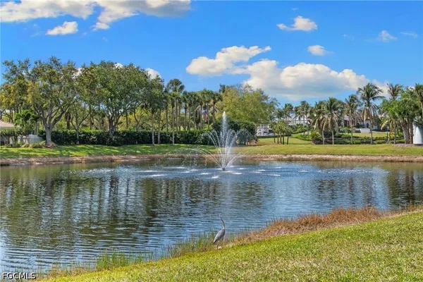 a view of a lake view with a big yard