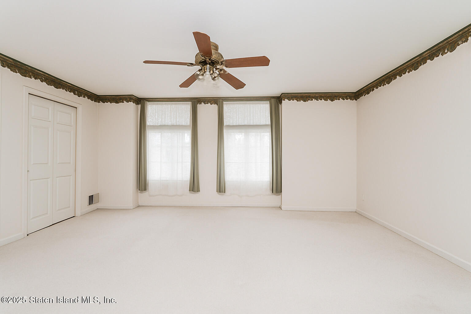 41 Wolcott Avenue Staten Island, NY 10312 - Photo 26 of 33 a view of an empty room with a window