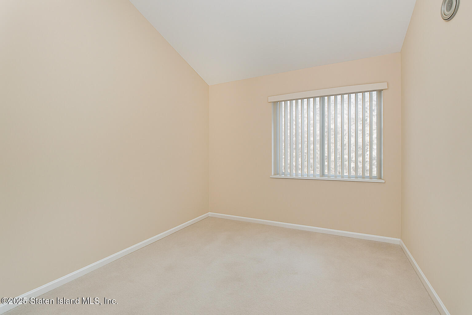 41 Wolcott Avenue Staten Island, NY 10312 - Photo 28 of 33 a view of an empty room with a window