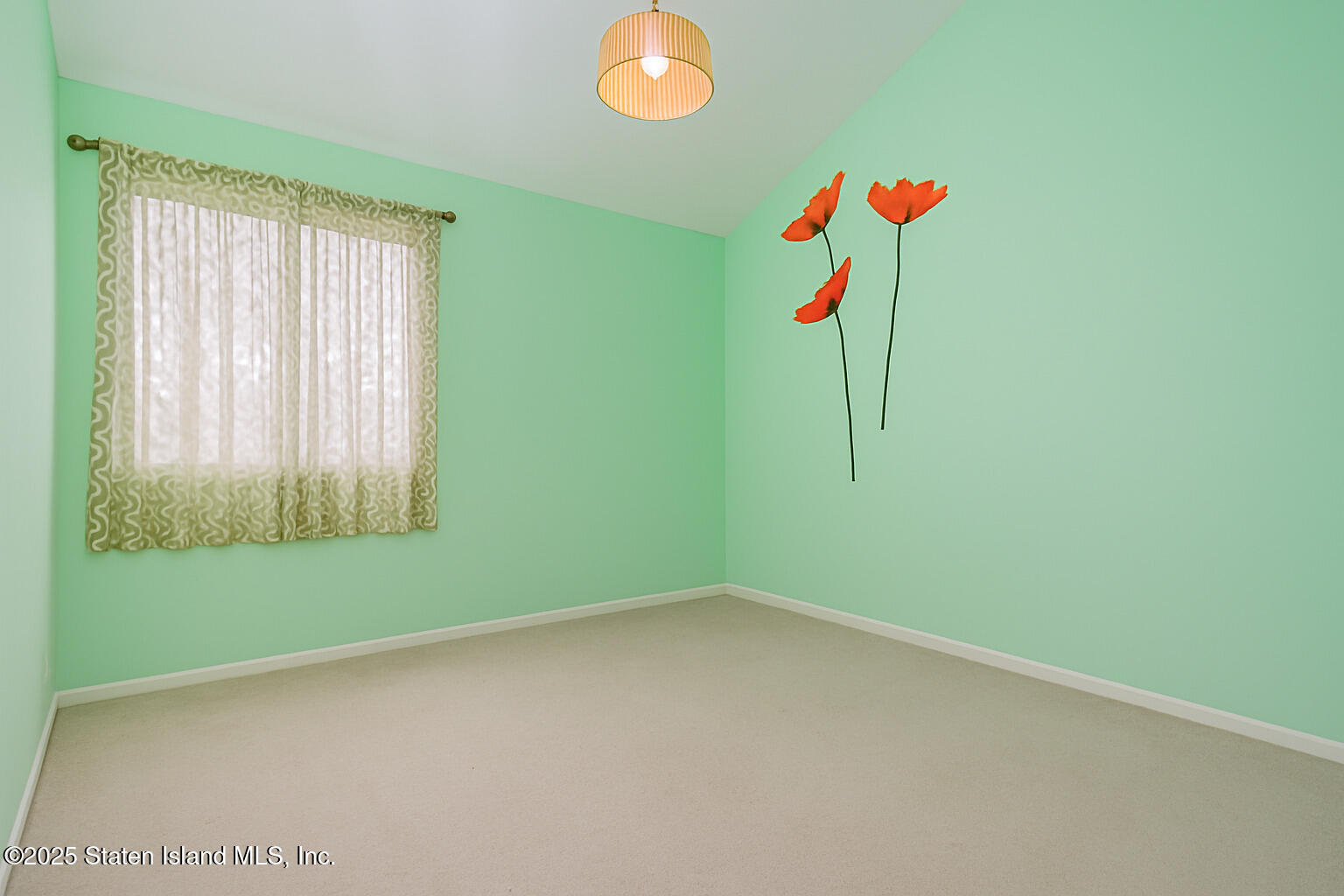 41 Wolcott Avenue Staten Island, NY 10312 - Photo 29 of 33 an empty room with a window