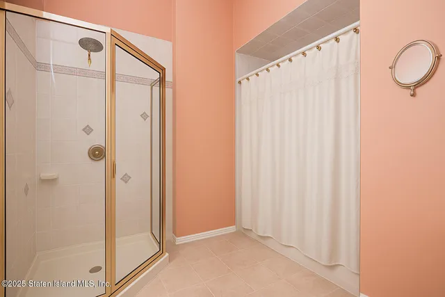 a view of a house with a wooden deck