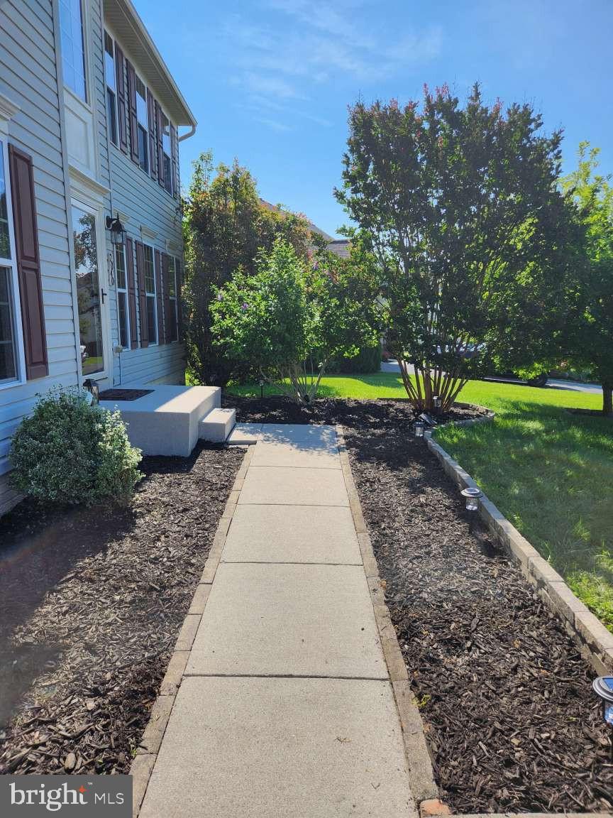 2040 Waterfall Drive Hanover, PA 17331 - Photo 16 of 25 a view of a yard with plants and a tree