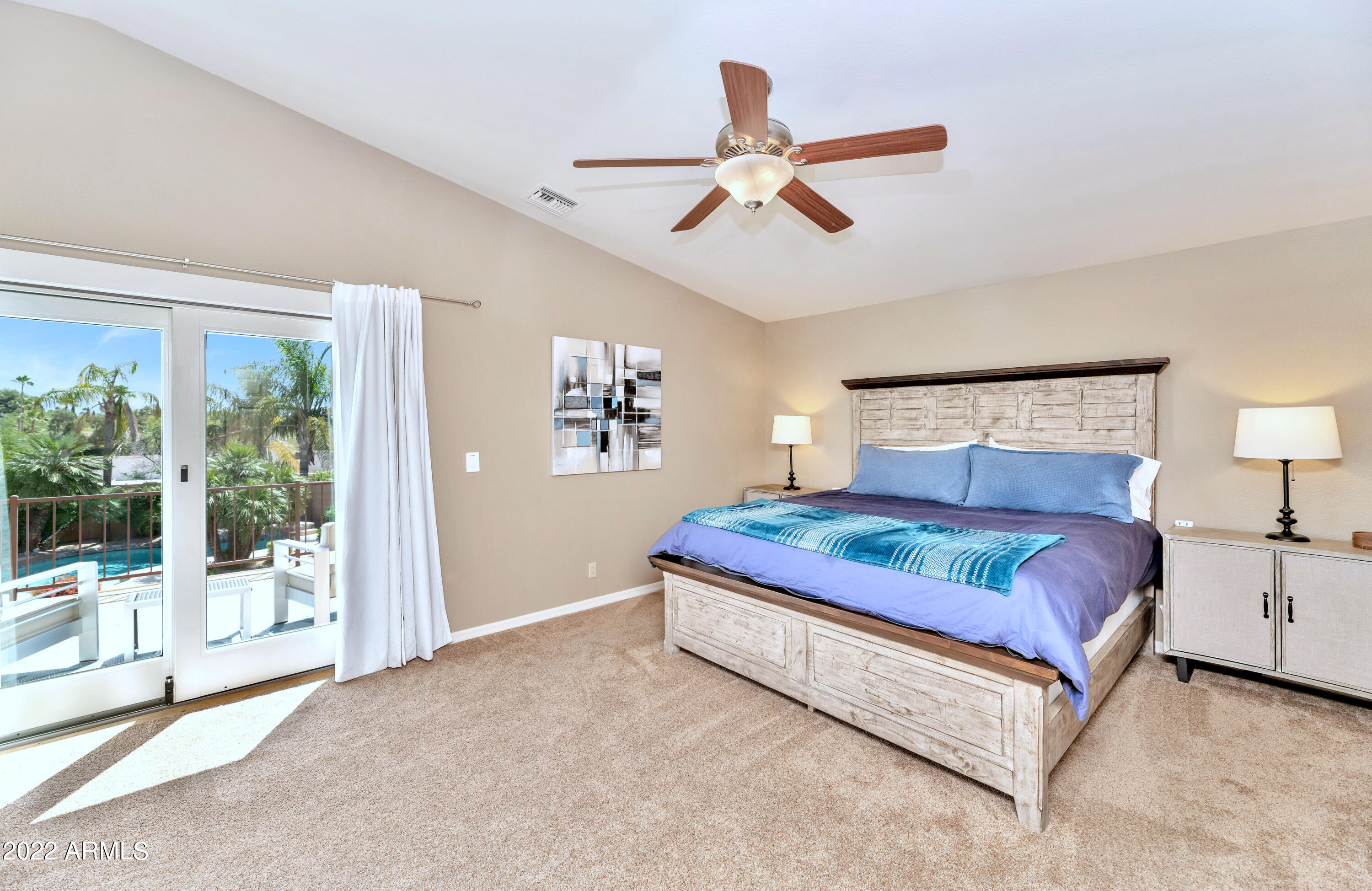 14227 North 57th Way Scottsdale, AZ 85254 - Photo 11 of 25 a bedroom with a bed and window
