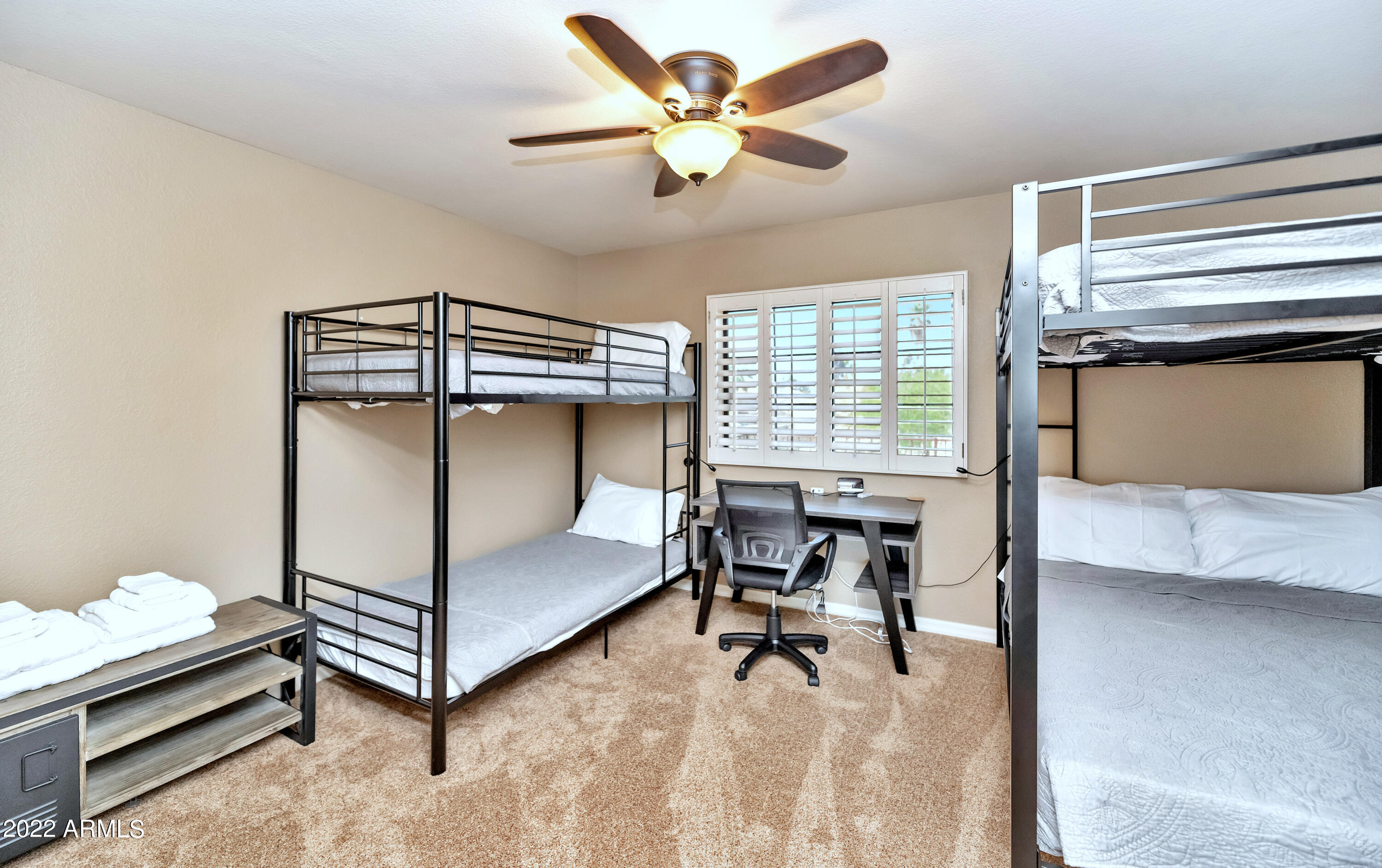 14227 North 57th Way Scottsdale, AZ 85254 - Photo 20 of 25 a bedroom with furniture and a window