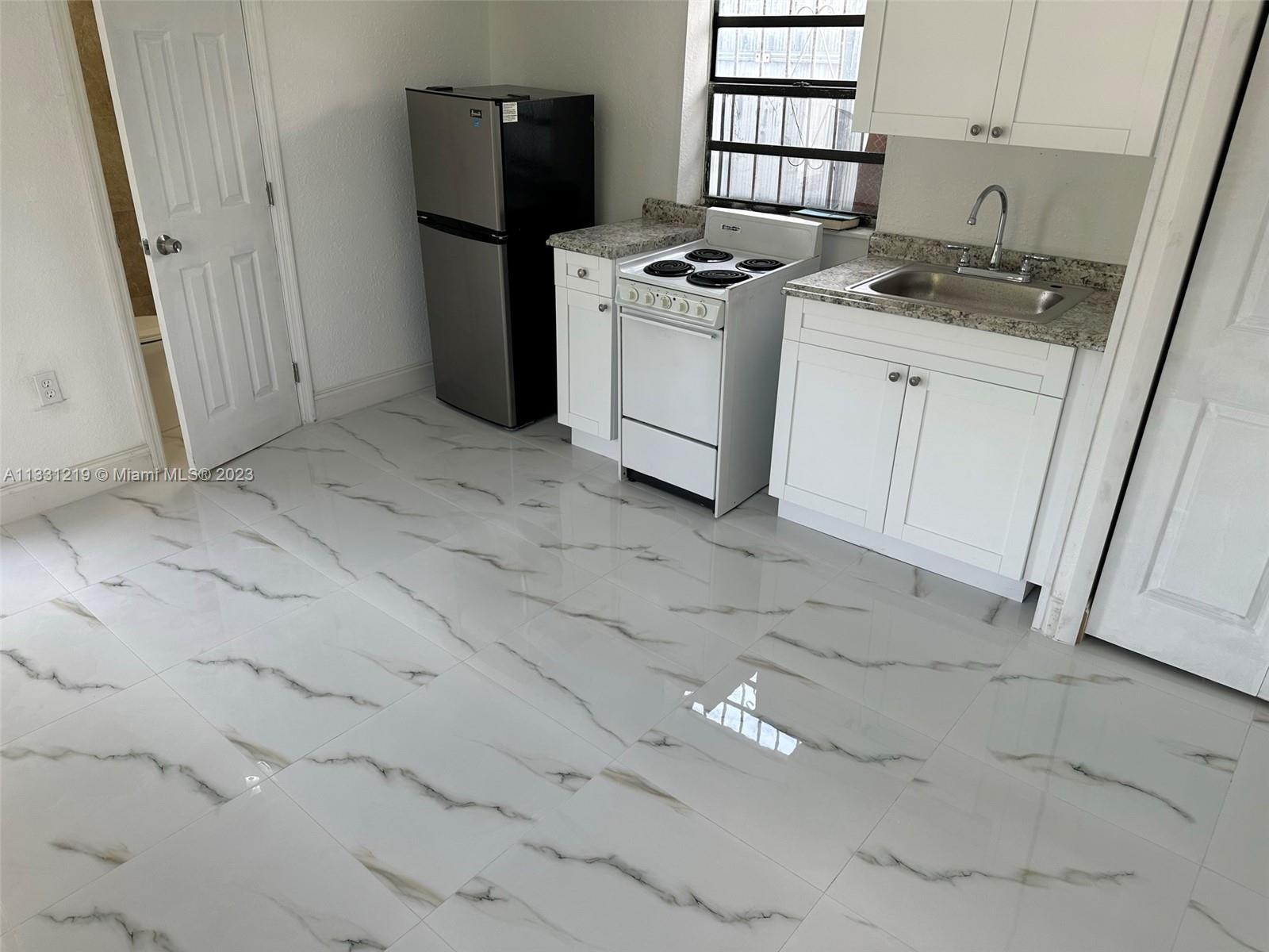 2625 Northwest 55th Street, Unit 3 Miami, FL 33142 - Photo 2 of 3