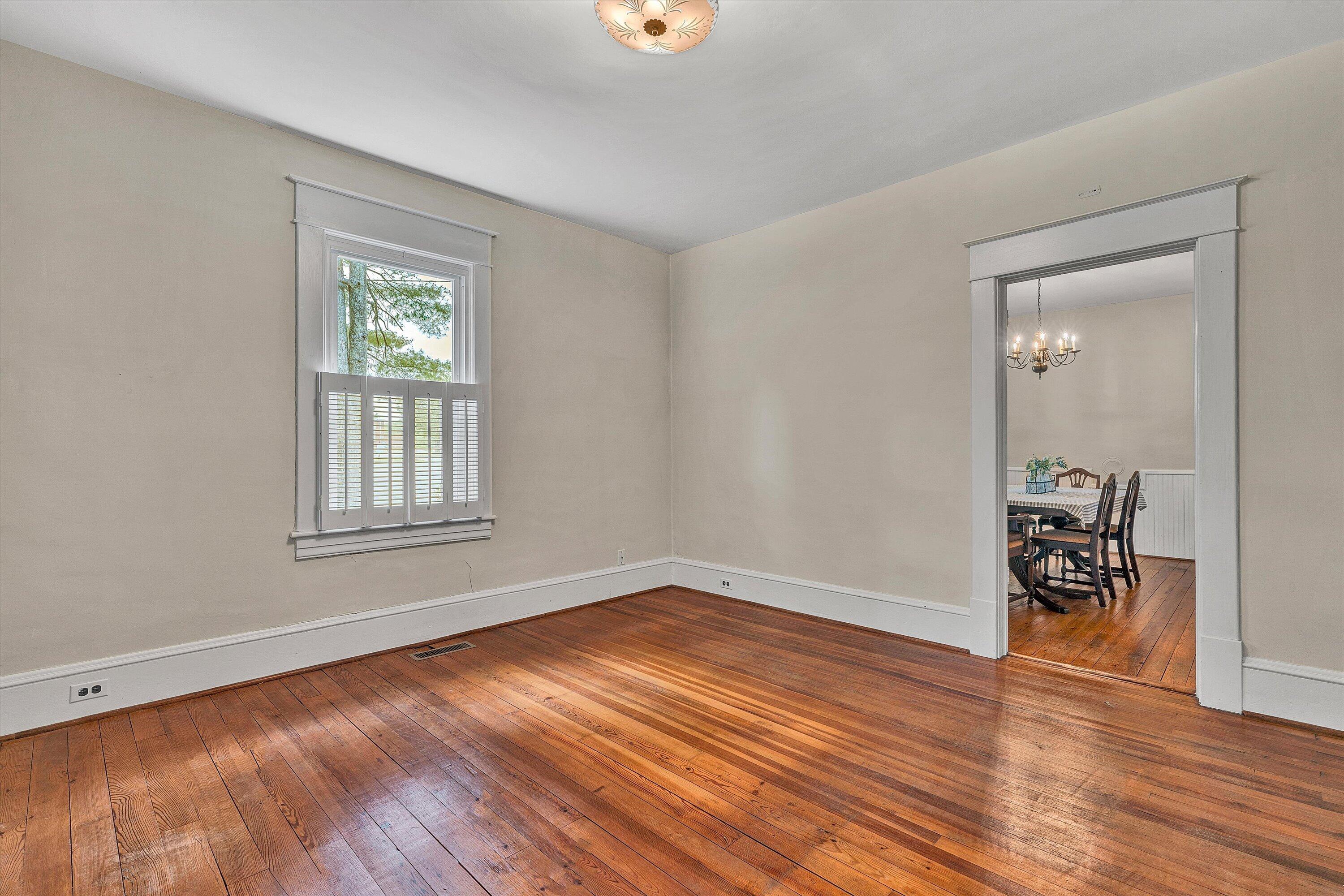 341 Springwood Road Fincastle, VA 24090 - Photo 20 of 55 wooden floor in an empty room with a window