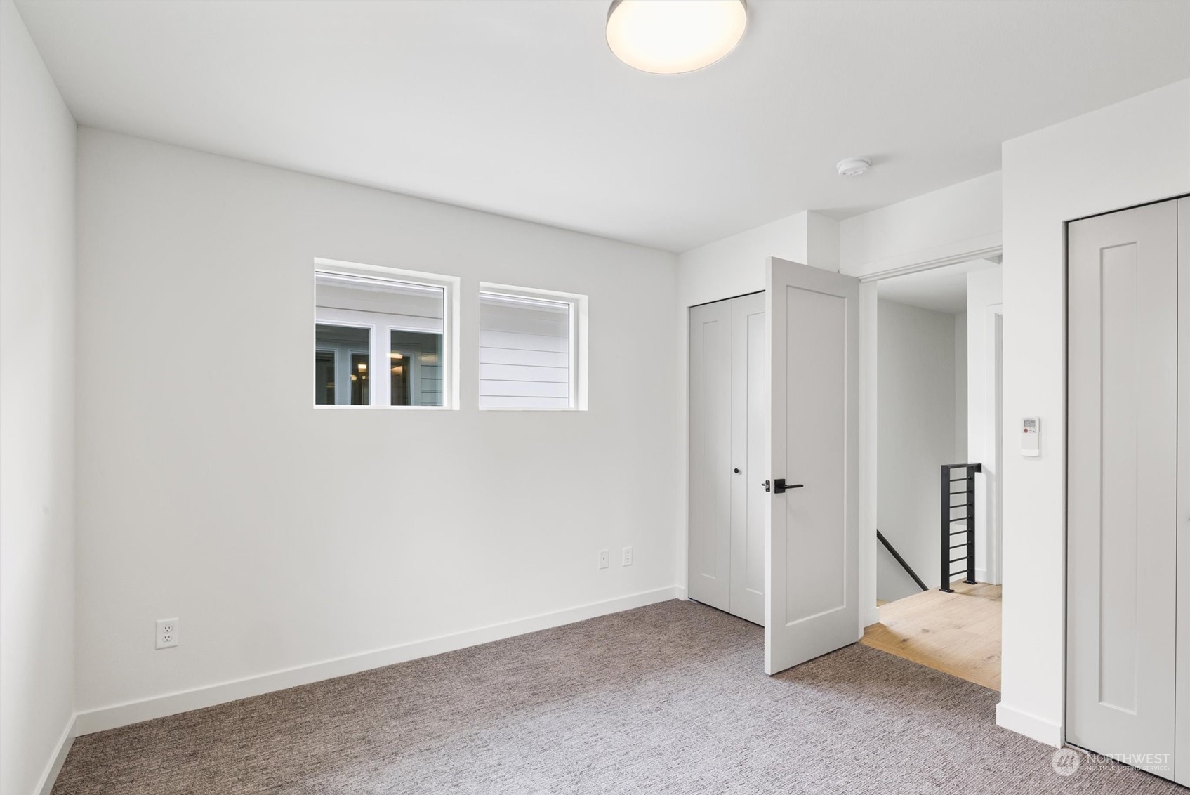 8021 17th Avenue Northwest Seattle, WA 98117 - Photo 18 of 23 a view of an empty room with a bathroom
