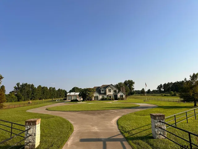 a view of a golf course with a lake