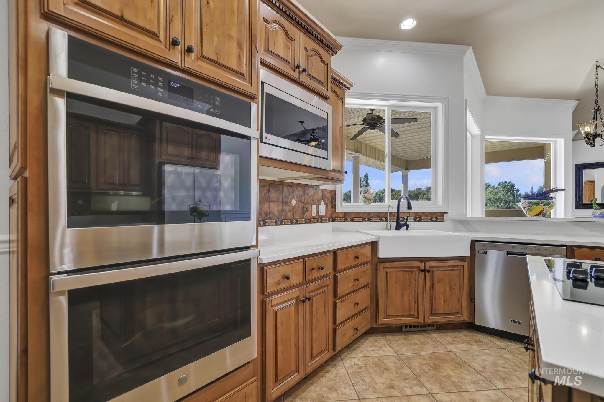 1301 Kanaka Rapids Road Buhl, ID 83316 - Photo 26 of 50 Stainless steel double wall ovens integrated into wood cabinetry