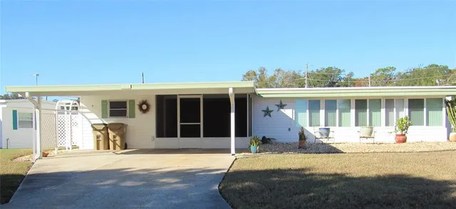 a front view of a house with a porch