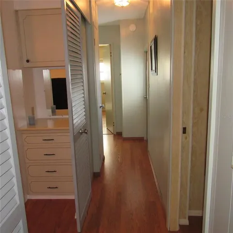 a bathroom with a shower and a sink