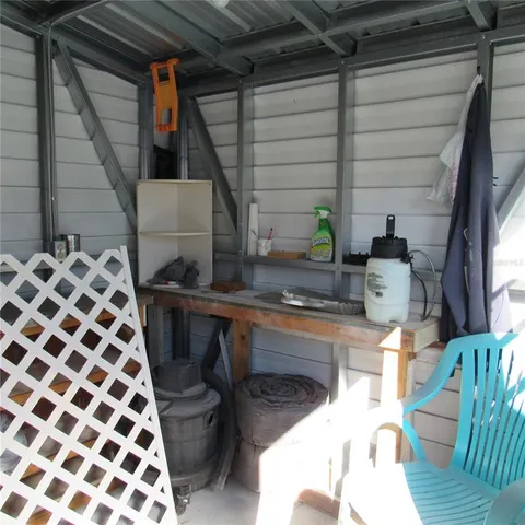 a view of a park with large trees