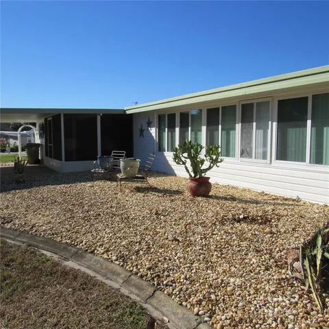 a front view of a house with a patio