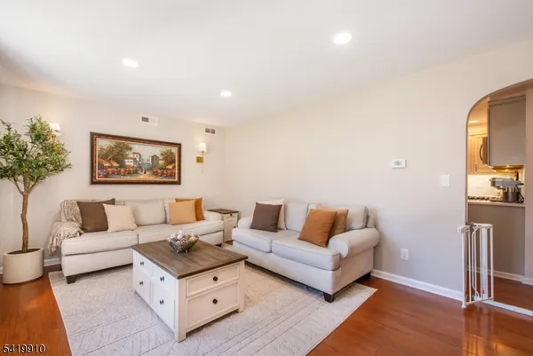 a living room with furniture and a couch
