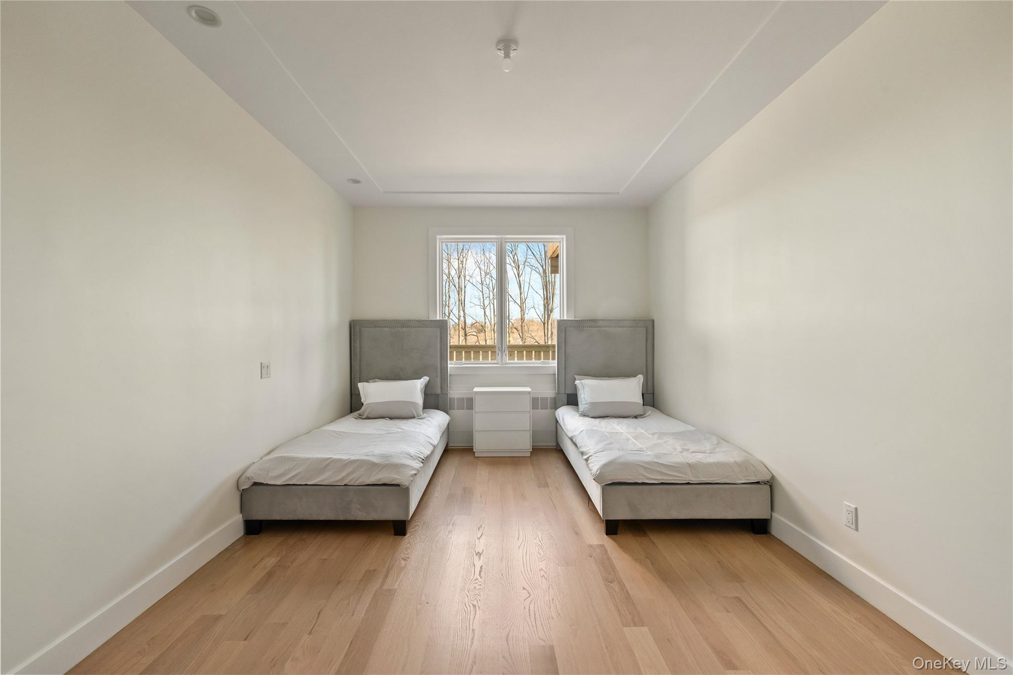 5 Valley Way, Unit 120 Spring Valley, NY 10977 - Photo 24 of 41 a bedroom with two beds and a window