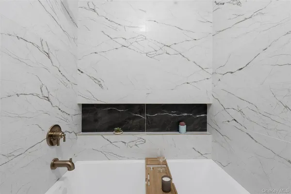 a bathroom with a sink and a shower
