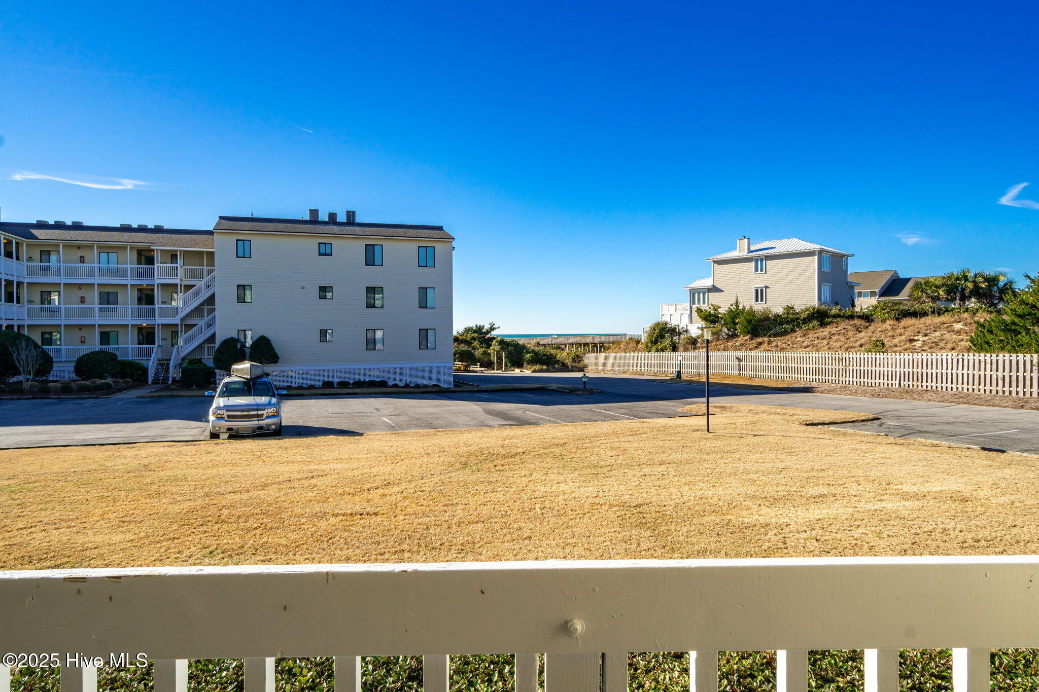10300 Coast Guard Road, Unit C103 POINT EMERALD VILLAS Emerald Isle, NC 28594 - Photo 29 of 44 View from covered porch