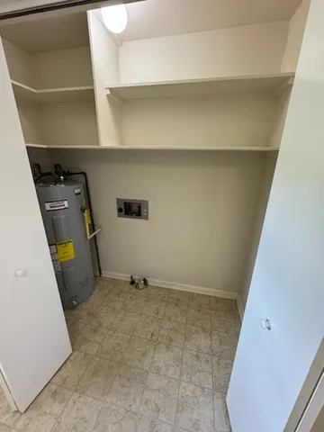 a view of storage and utility room