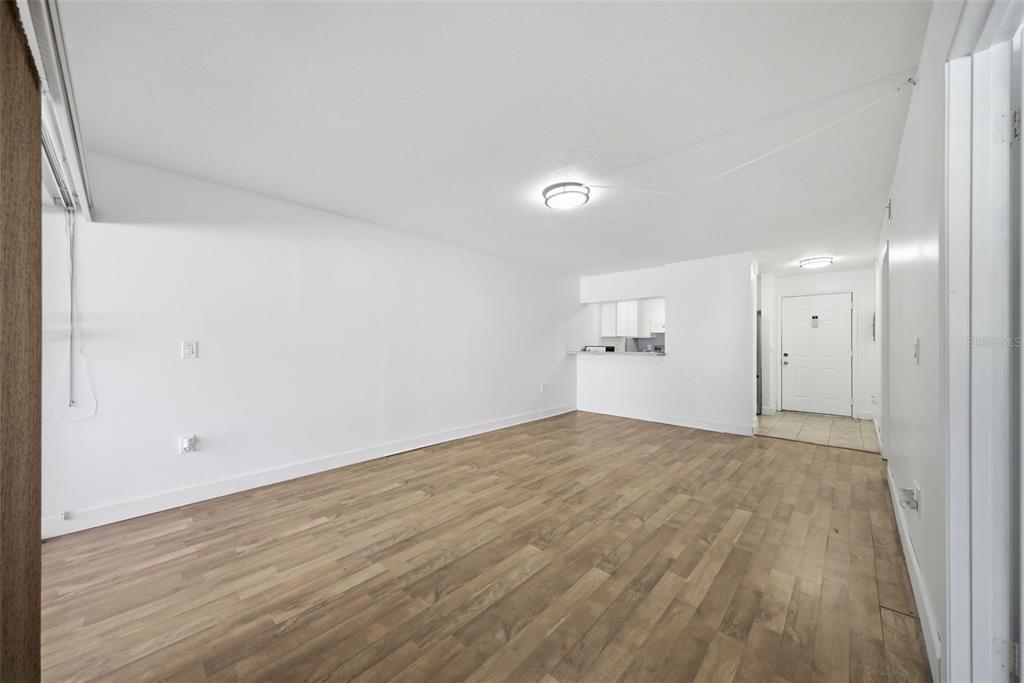 141 Fernery Road, Unit A3 Lakeland, FL 33809 - Photo 9 of 40 a view of empty room with wooden floor