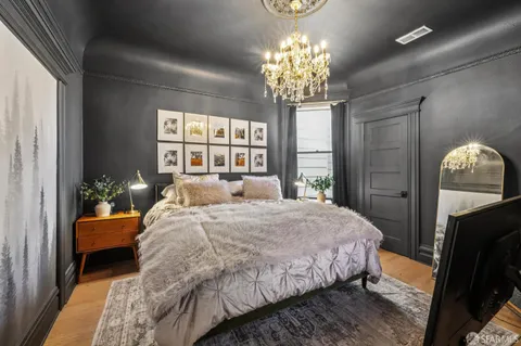 a bathroom with a sink toilet and mirror