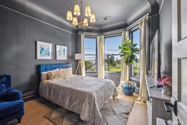 a view of a patio with couches and potted plants